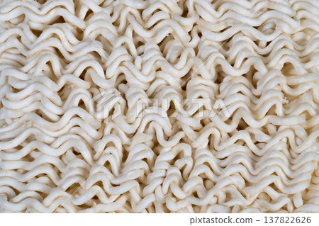 Minimalist styled dry noodle arrangement for social media visuals. Fashionable and airy presentation of instant noodles for social media culinary photography and branding 137822626