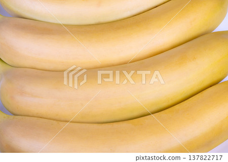 Healthy fruit start. Beginning day with nutritious ripe bananas and bright sunlight. Enjoying wholesome plantbased breakfast featuring ripe bananas under morning sunlight Healthy fruit start. Beginning day with nutritious ripe bananas and bright sunlight. Enjoying wholesome plantbased breakfast featuring ripe bananas under morning sunlight 137822717
