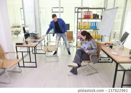 Busy professionals collaborate in a modern office space during a productive brainstorming session in the mid-morning light Busy professionals collaborate in a modern office space during a productive brainstorming session in the mid-morning light 137822961