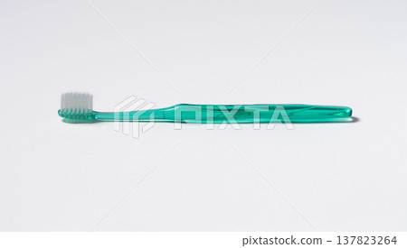 Green toothbrush 137823264