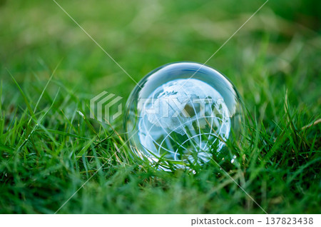 Renewable energy concept Earth Day or environment protection Hands protect forests that grow on the ground and help save the world. Renewable energy concept Earth Day or environment protection Hands protect forests that grow on the ground and help save the world. 137823438