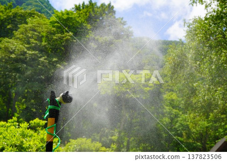Outdoor mist showers are great for beating the summer heat. 137823506