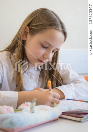 Cute child girl at school Cute child girl at school 137823547