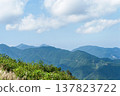 A panoramic view from the summit of Mt. Bōnoori (Bōnomine), with layers upon layers of ridgelines and white autumn clouds. 137823722