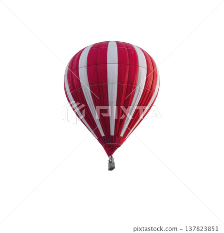 Vibrant red and white striped hot air balloon floats gracefully against clear sky, evoking sense of adventure and freedom. balloon colorful pattern stands out vividly 137823851