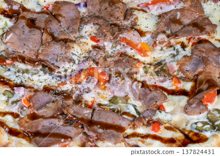 Gourmet toppings on pizza. Flavorful pizza with mix of savory meats and fresh vegetables. Exquisite pizza options loaded with variety of tasty meats and vibrant vegetables Gourmet toppings on pizza. Flavorful pizza with mix of savory meats and fresh vegetables. Exquisite pizza options loaded with variety of tasty meats and vibrant vegetables 137824431