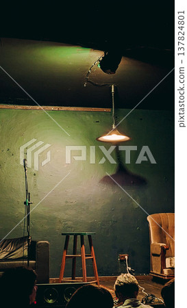 Cozy stage with microphone and stool Cozy stage with microphone and stool 137824801
