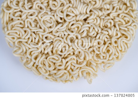 Warm noodles in tasty broth. Steaming noodles immersed in flavorful herb broth. Detailed image of instant noodles soaking in aromatic savory broth with parsley garnish Warm noodles in tasty broth. Steaming noodles immersed in flavorful herb broth. Detailed image of instant noodles soaking in aromatic savory broth with parsley garnish 137824805