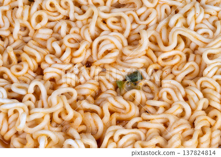 Fast work lunch. Quick noodle meal in office. Convenient instant noodles for busy professionals. Efficient quick lunch option with easy preparation for workplaces Fast work lunch. Quick noodle meal in office. Convenient instant noodles for busy professionals. Efficient quick lunch option with easy preparation for workplaces 137824814