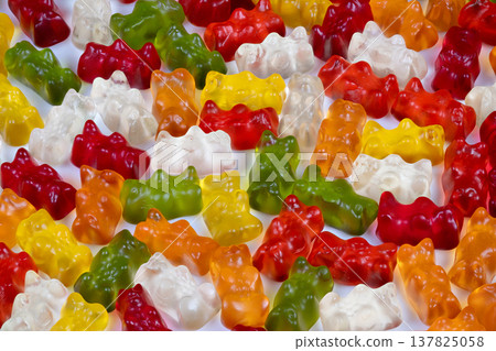 Multicolored gummy bears highkey food photograph, bright white backdrop with saturated candy tones and clean modern look, ideal for advertising, menus and recipe visuals Multicolored gummy bears highkey food photograph, bright white backdrop with saturated candy tones and clean modern look, ideal for advertising, menus and recipe visuals 137825058