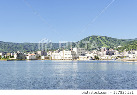 Otaru City, Hokkaido: Otaru Tenguyama, the symbol of Otaru, and the cityscape of Otaru. 137825151