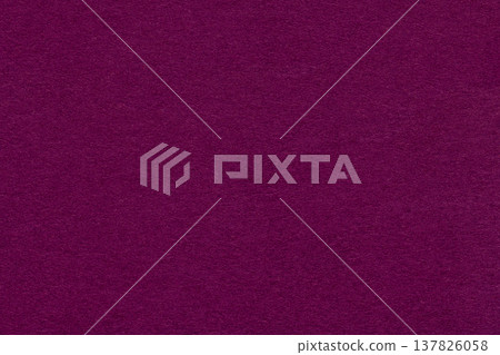 Dark purple textured paper background with subtle grain surface and soft structure. Burgundy backdrop, macro Dark purple textured paper background with subtle grain surface and soft structure. Burgundy backdrop, macro 137826058