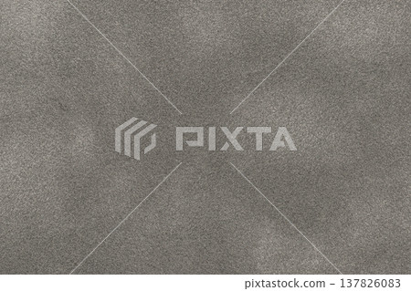Gray suede fabric background with matte nap velvet texture. Graphite tones and soft felt textile surface in macro 137826083