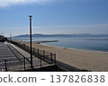 The Japanese coastline, with its tetrapods and seawalls stretching along the way, and the blue sky. 137826838