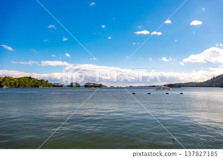 Matsushima Town, Miyagi Prefecture: A beautiful autumn day with clear blue skies and islands floating in the calm Matsushima Bay. Matsushima Town, Miyagi Prefecture: A beautiful autumn day with clear blue skies and islands floating in the calm Matsushima Bay. 137827185