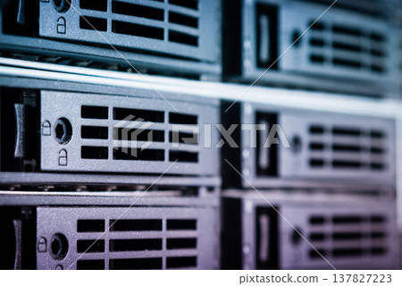 cluster of data storage SSD hard drives inside server rack cluster of data storage SSD hard drives inside server rack 137827223