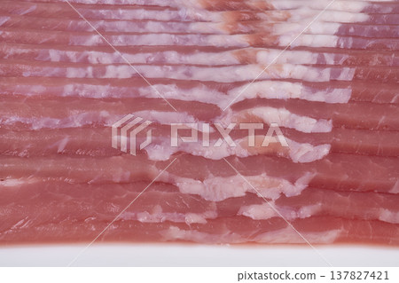 High detail bacon marbling forms abstract textures suitable for design. Wavy bacon with pink and white bands produces artistic food textures ideal for creative projects High detail bacon marbling forms abstract textures suitable for design. Wavy bacon with pink and white bands produces artistic food textures ideal for creative projects 137827421