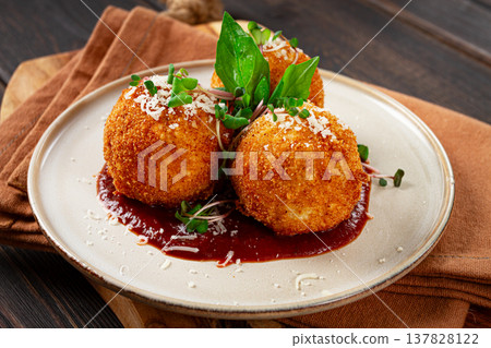 Crispy Arancini appetizer, with parmesan cheese and microgreens, plate, tomato sauce, homemade, no people, Crispy Arancini appetizer, with parmesan cheese and microgreens, plate, tomato sauce, homemade, no people, 137828122