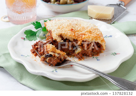 Greek dish moussaka, baked eggplant with minced meat, with bechamel sauce, home cooking, Greek dish moussaka, baked eggplant with minced meat, with bechamel sauce, home cooking, 137828132