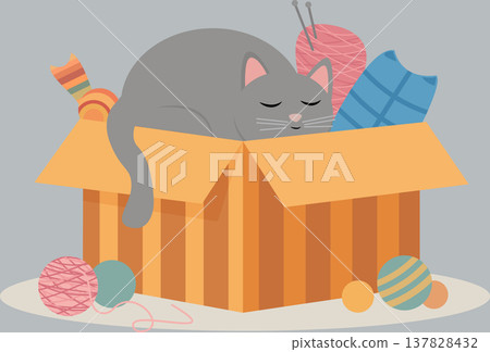 Domestic kitten resting in a box filled with bright yarn. PNG Domestic kitten resting in a box filled with bright yarn. PNG 137828432