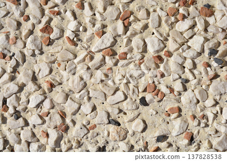 Decorative pebble dash wall texture with white and terracotta stones Decorative pebble dash wall texture with white and terracotta stones 137828538