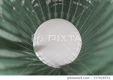 Inside view of a green plastic garden mesh roll 137828552