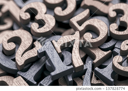 Pile of old wooden numbers in vintage style. Mathematics, education and learning concept. 137828774