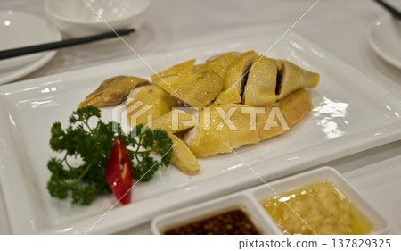 Cantonese-style steamed chicken plate Cantonese-style steamed chicken plate 137829325