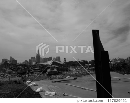 A scene documenting the demolition work at the former National Stadium site. 137829431