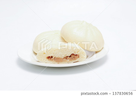 Steamed buns on a white plate Steamed buns on a white plate 137830656