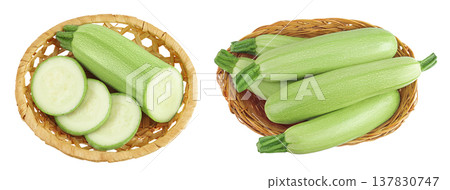 zucchini or marrow in a wicker basket isolated on white background with full depth of field. Top view. Flat lay 137830747