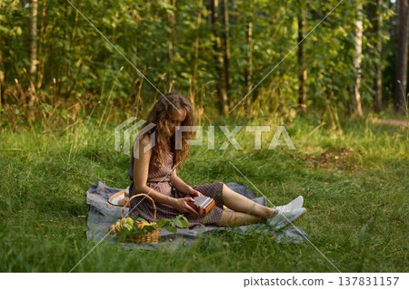 meadow journaling ritual woman writing in nature 137831157