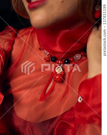 Luxurious silk jewelry complemented by passionate and moody lighting 137831199