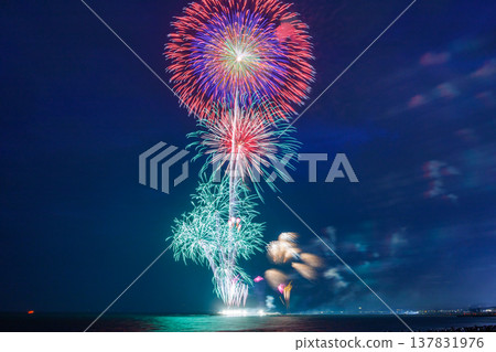 Colorful starbursts shining in the night sky Colorful starbursts shining in the night sky 137831976