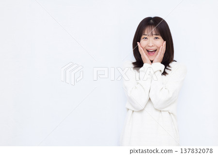 Smiling and surprised woman Smiling and surprised woman 137832078