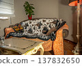Cozy sofa with blanket 137832650