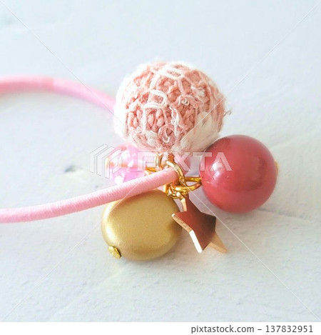 Handmade kids' hair ties with lots of colorful beads and tweed fabric ball charms. 137832951