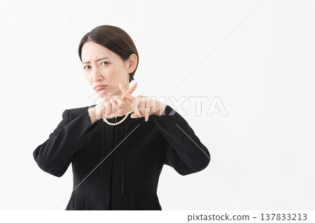 Woman in mourning clothes Funeral image 137833213