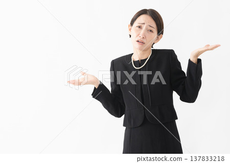 Woman in mourning clothes Funeral image 137833218