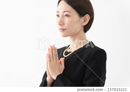 Woman in mourning clothes Funeral image Woman in mourning clothes Funeral image 137833221