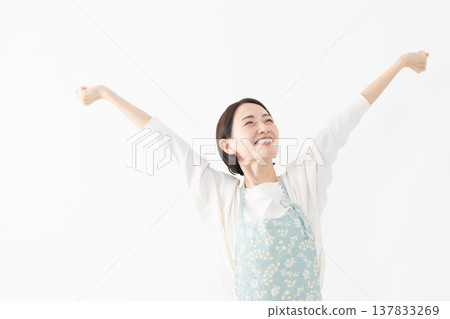 Woman wearing an apron Lifestyle image 137833269