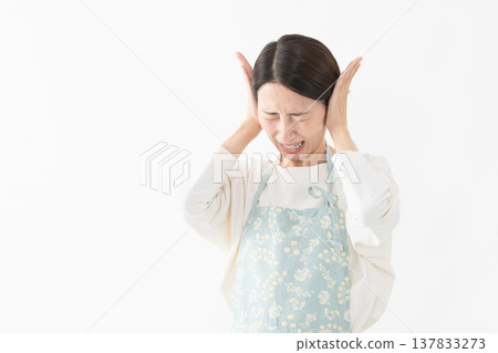 Woman wearing an apron Lifestyle image 137833273