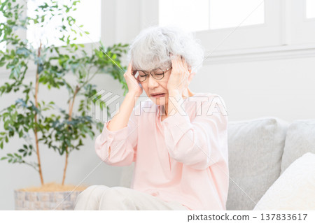Senior woman with headache 137833617