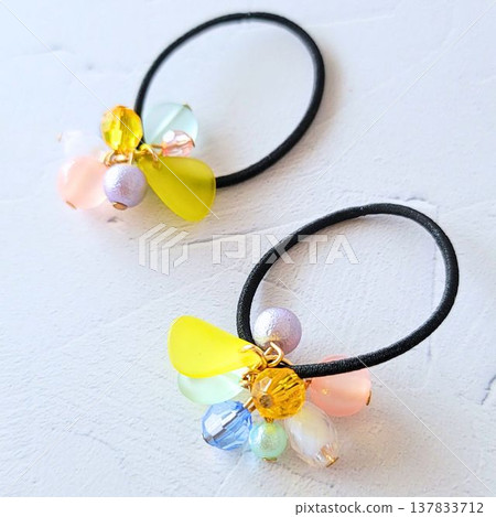 Handmade kids' hair ties with lots of colorful beads 137833712