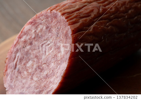 Close-up of a salami sausage cross-section 137834202