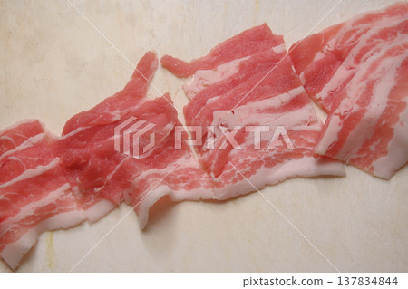 Pork belly cut on a cutting board Pork belly cut on a cutting board 137834844