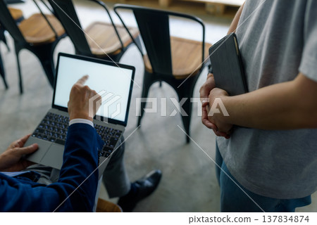 University professors and students teaching on laptops 137834874