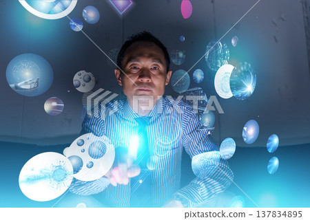The face of a businessman pointing in the darkness The face of a businessman pointing in the darkness 137834895