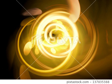 A swirling wave of golden neon light against a black background. Technology/Digital background. A swirling wave of golden neon light against a black background. Technology/Digital background. 137835388