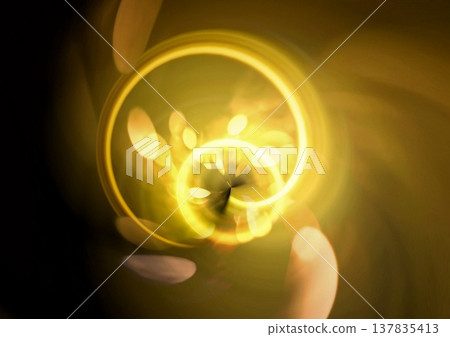A swirling wave of golden neon light against a black background. Technology/Digital background. 137835413